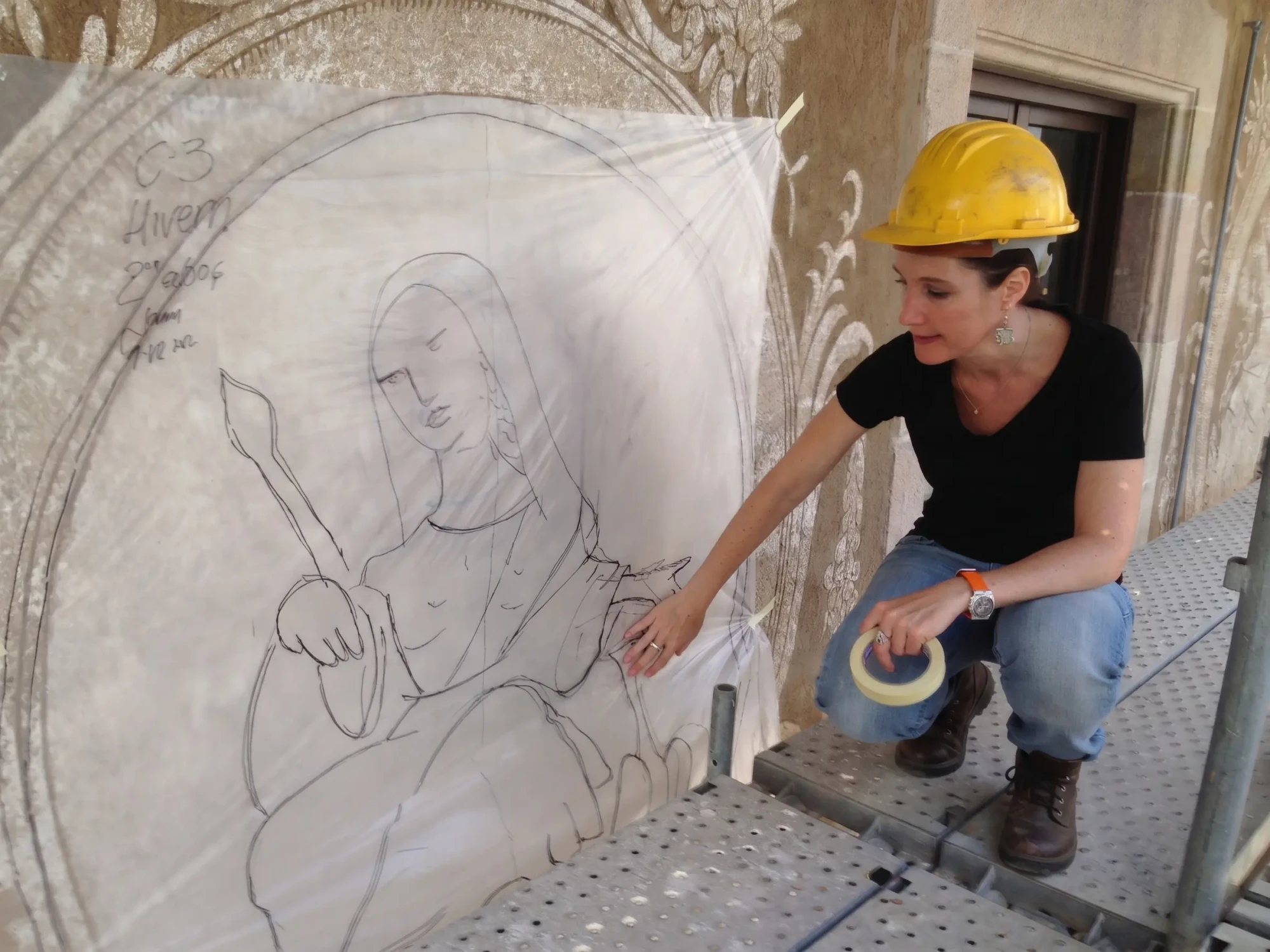 Restauraciò d'esgrafiats del carrer avinyo